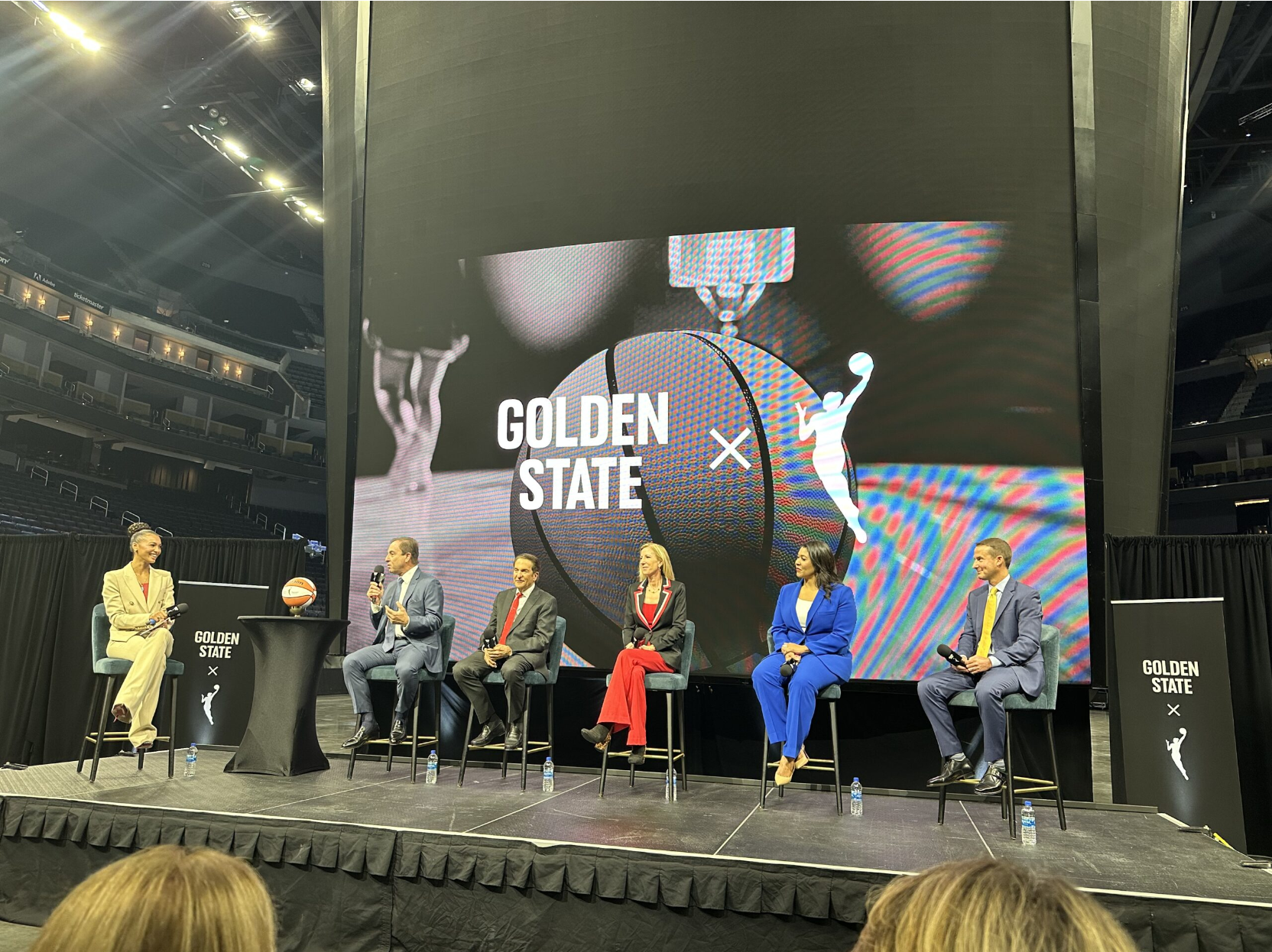 WNBA commissioner Cathy Engelbert, Golden State Warriors owner Joe Lacob and others answer the questions from Malika Andrews during the introduction of the Golden State WNBA team, set to play in 2025. (Photo via Alex Simon/SFGate)